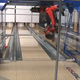 Illustration for article titled Robot Progress Report: Can We Still Beat a Bucket of Bolts at Bowling?